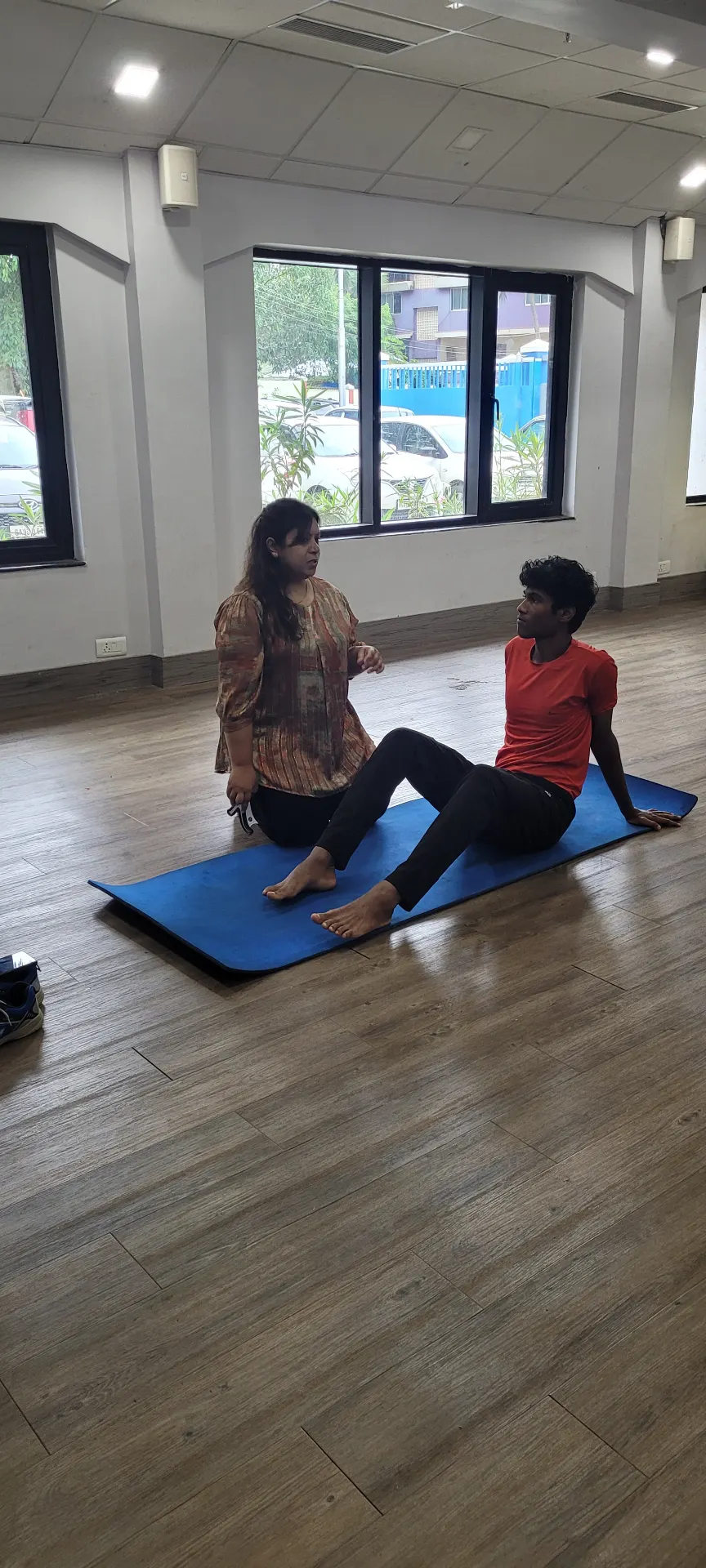 A guided rehabilitation exercise being performed under supervision